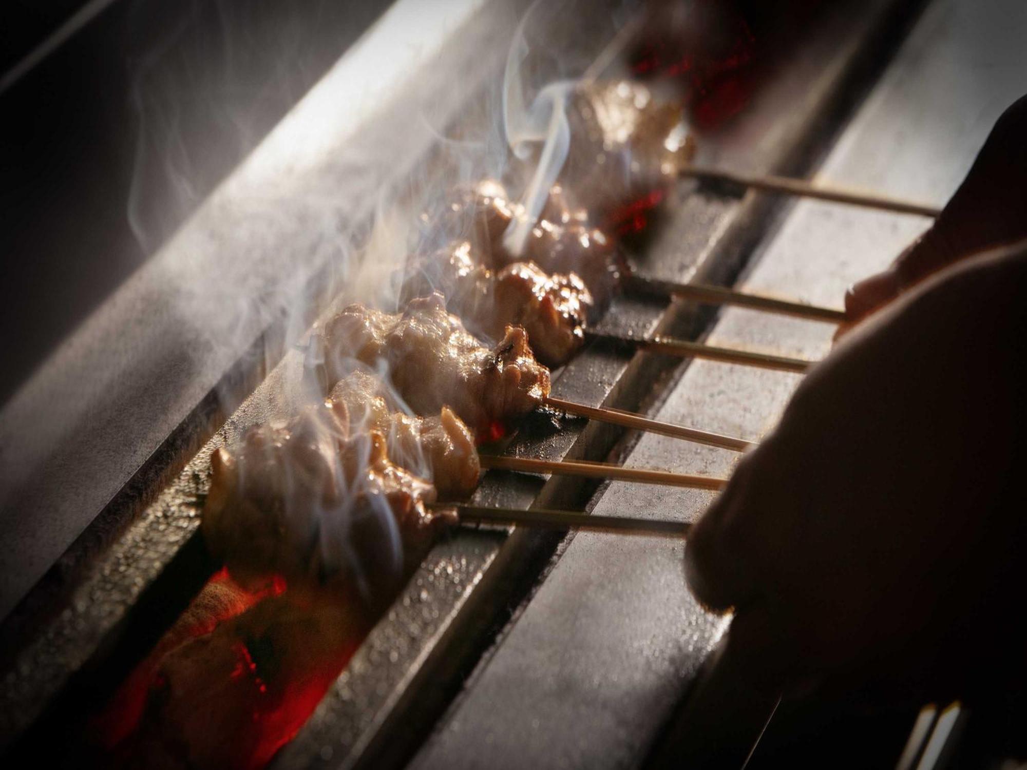 Nagoya Kanko Hotel Zewnętrze zdjęcie Yakitori being grilled